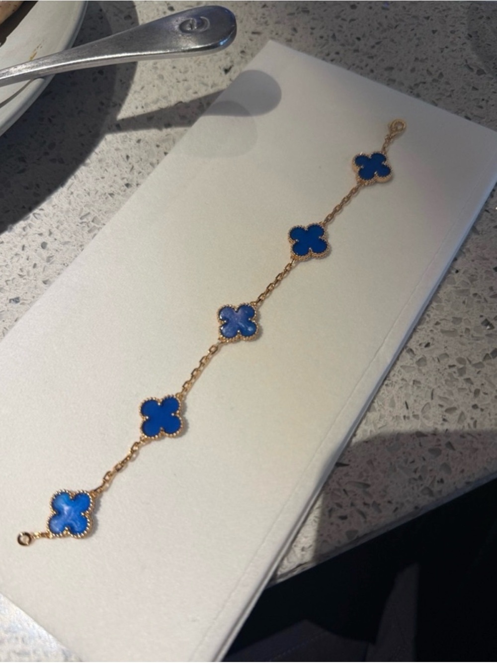 Gold Bracelet with Blue Clover Motifs